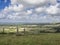 Tunning vibrant landscape image of English countryside on lovely Summer afternoon overlooking rolling hills and country villages