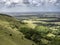 Tunning vibrant landscape image of English countryside on lovely Summer afternoon overlooking rolling hills and country villages