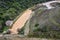 Turbines and hydroelectric power station next to the spillway