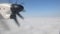 Turboprop airplane flying over fog