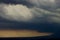 Turbulent storm clouds. Dark turbulent storm clouds forming in advance of thunder storm in the evening.