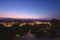 Turin, Italy. Panoramic view of the city illuminated in the evening after sunset. Skyline with the Mole in the evening. July 1,