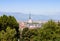 Turin - Italy - Urban skyline with Mole Antonelliana building, blue sky and Alps mountains