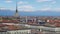 Turin, Torino, aerial timelapse skyline panorama with Mole Antonelliana, Monte dei Cappuccini and the Alps in the background.