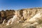 Turkey, Cappadocia. Rocks around Cavusin with carved caves in them