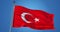 Turkey flag in the wind against clear blue sky, 3d illustration