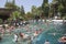 Turkey, Pamukkale - June 22, 2019. Ancient thermal swimming pool Cleopatra in Pamukkale full of people, Turkey