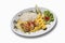 Turkey steak with rice and pineapple in plate