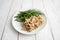 Turkey Stroganoff on white wood table with green beans