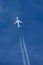 Turkish Airlines Boeing 777 airliner flying at high altitude with four contrails flowing behind it.