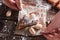 Turkish baklava serving, hands taking dessert