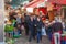 Turkish bazaar street view with sellers and crowd of buyers