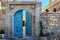 Turkish carved stone gate with wooden doors
