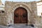 Turkish carved stone gate with wooden doors