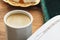 Turkish coffee cup and quran book close up