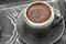 Turkish coffee with traditional embossed metal cup and tray