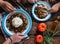 Turkish cuisine family feast. Flat-lay of people celebrating with lamb chops, quince, bean, salad, babaganush, rice pilav, pumpkin