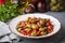 Turkish cuisine green olive salad (Turkish name Kirma yesil zeytin salatasi