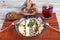 Turkish cuisine, Samsun style ravioli. Turkish ravioli manti preparation with meat, yoghurt, butter and red pepper. MantÄ± concept