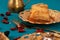 Turkish delight dessert on traditional tableware on dark blue table