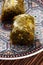 Turkish Dessert fÄ±stÄ±k ezmesi baklava with pistachio on wooden