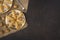 Turkish famous traditional homemade flour halva served with walnut in plate on rustic background