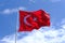 Turkish flag with a clear blue sky