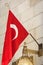 Turkish flag is hanging on wall