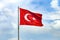 The Turkish flag is the national and official flag of the Republic of Turkey. [1] It is formed with a white crescent and star on a