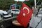 Turkish flag on the stern of the yacht at the berth of the Netsel Marina yacht club in the center of Marmaris