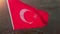 Turkish flag in sunset sunlight close-up