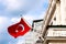 Turkish flag waving from the embassy balcony in London exterior view front entrance outdoors