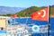 Turkish flags waving on tourist boats in the magnificent Adrasan.