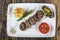 Turkish Food Meatball Kofte. Kofta with Tomatoes and Onion in Plate Portion. Grilled Kofte. Spicy meatballs Kebab or Kebap healthy