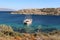 Turkish gulet - a type of Turkish wooden schooner boats - moored in emerald Mediterranean sea waters.