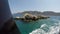 Turkish gulets with tourists float by the sea rocks and reefs