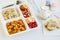Turkish Meal with chicken potato,rice,tomato salad and fruits in the white portion food tray