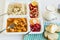 Turkish Meal with chicken potato,rice,tomato salad and fruits in the white portion food tray