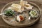 Turkish meze vegetarian tapas snack platter on rustic wood table