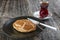 Turkish Pastry Pogaca with Tea / Cay on wooden surface. Traditional Bakery