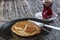 Turkish Pastry Pogaca with Tea / Cay on wooden surface. Traditional Bakery