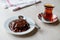 Turkish Pudding Muhallebi with Chocolate Sauce and Traditional Tea.