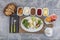 Turkish style breakfast; Traditional Turkish breakfast platter on the table, top view. Healthy Turkish breakfast in the bright