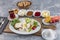 Turkish style breakfast; Traditional Turkish breakfast platter on the table, top view. Healthy Turkish breakfast in the bright