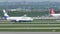 Turkish and SunExpress jets taxiing in Munich Airport