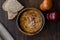 Turkish Traditional Vermicelli Soup in a wooden bowl / Tel sehriye corbasi.