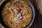 Turkish Traditional Vermicelli Soup in a wooden bowl / Tel sehriye corbasi.