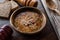 Turkish Traditional Vermicelli Soup in a wooden bowl / Tel sehriye corbasi.