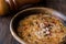 Turkish Traditional Vermicelli Soup in a wooden bowl / Tel sehriye corbasi.