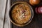 Turkish Traditional Vermicelli Soup in a wooden bowl / Tel sehriye corbasi.